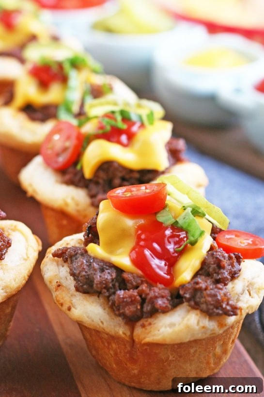 Another enticing perspective of the finished cheeseburger biscuit bites, perfectly prepared and ready for serving to delighted guests.