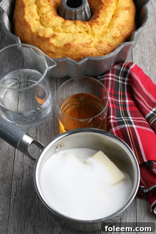 Now that the rum soaked cake is baked we can make the rum cake glaze as well.