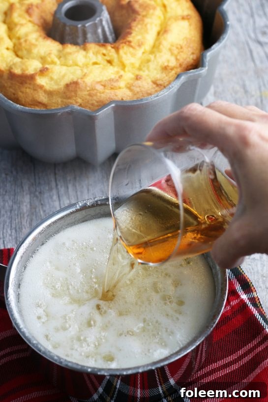 Here we see the rum going into the rum cake glaze!
