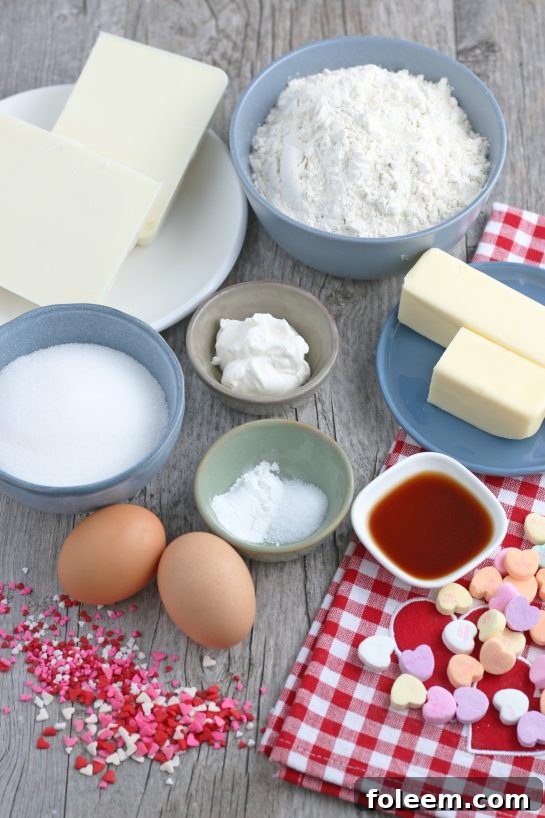 Here we see all of the ingredients meticulously laid out, ready to be used to make the delightful conversation heart cookies, promising a fun and organized baking experience!