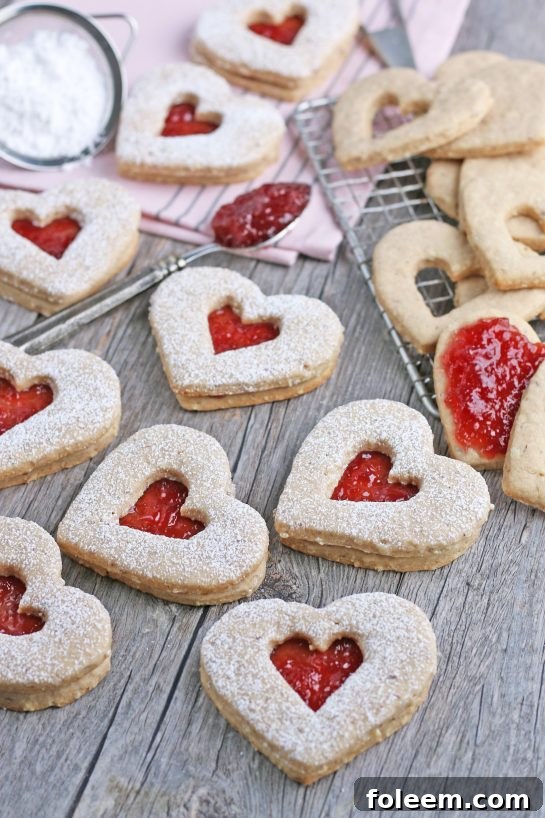Our first completed batch of delicious Linzer cookies, beautifully arranged and ready for tasting.