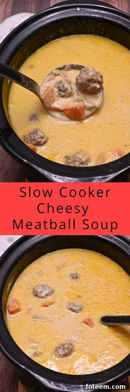 Close-up of a ladle serving Slow Cooker Cheesy Meatball Soup into a bowl