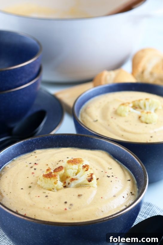 Another enticing view of the finished Roasted Cauliflower Soup, perfectly blended to a smooth consistency and ready to be served and enjoyed, perhaps as a comforting meal.