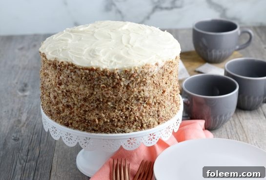Homemade Hummingbird Cake is a beloved, classic southern cake recipe packed with banana and pineapple that looks so impressive for a holiday or birthday party!