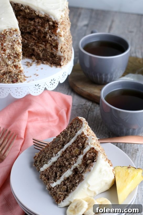 Homemade Hummingbird Cake is a beloved, classic southern cake recipe packed with banana and pineapple that looks so impressive for, Easter, Mother's day, or birthday party!