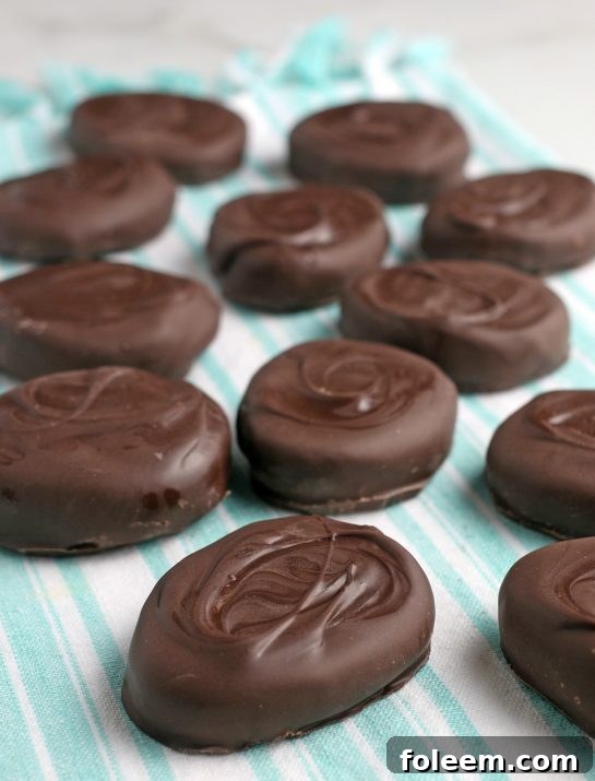 This shot shows the finished homemade chocolate peanut butter eggs looking irresistibly tasty and ready to be eaten.