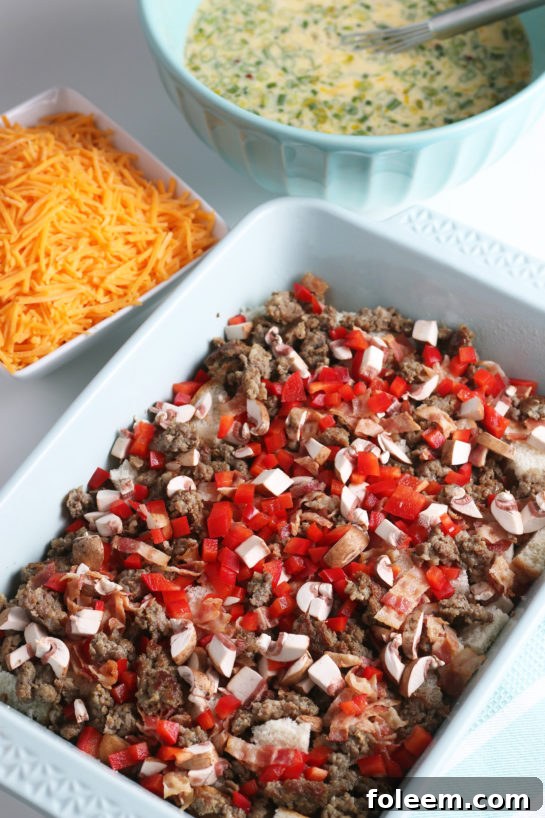 Here we see more vegetables being added to the casserole along with the sausage. It makes for the best breakfast egg casserole.