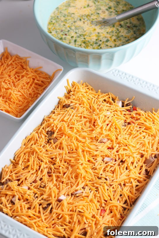 The best step in making an overnight egg casserole is to top it with cheese. It's makes the perfectly melted, delicious, topping!