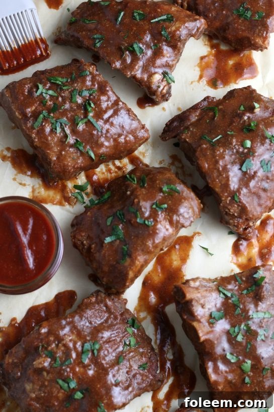 This image shows a closer view, top down, of the bbq ribs made in the crock pot.