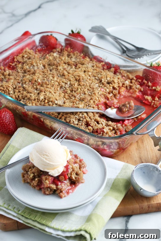 Strawberry & Rhubarb crisp recipe finished in the pan and out of the oven and plated