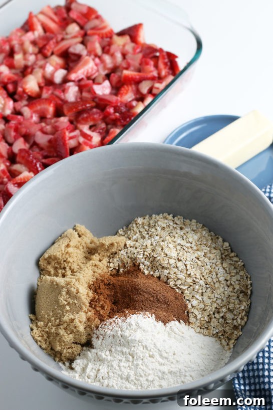 Mixing the dry ingredients for Strawberry & Rhubarb crisp recipe