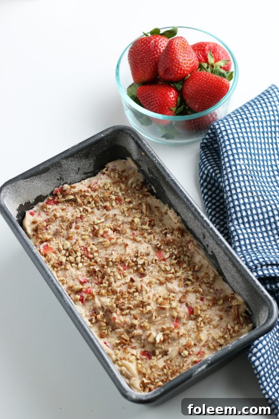 Our delicious strawberry bread batter, perfectly mixed and ready to be placed into the oven for baking.