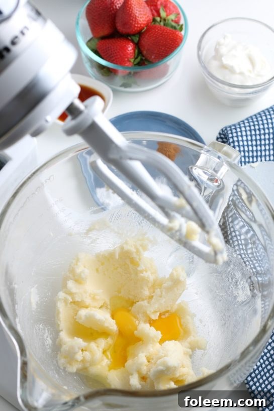 The butter and sugar are beautifully creamed together in the stand mixer, now with the addition of eggs, creating a smooth and luscious base for the bread.