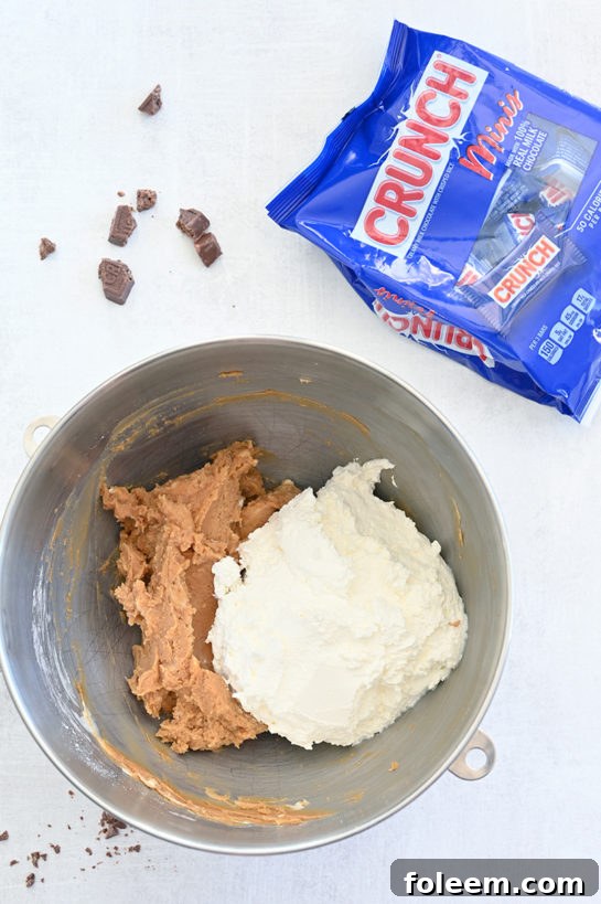 The peanut butter and whipped topping about to be blended for the Peanut Butter Crunch Bar Dip recipe