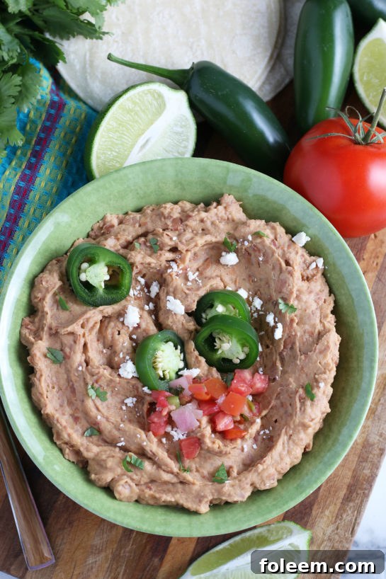 Rich, flavorful homemade refried beans, so good you'll never buy canned again.