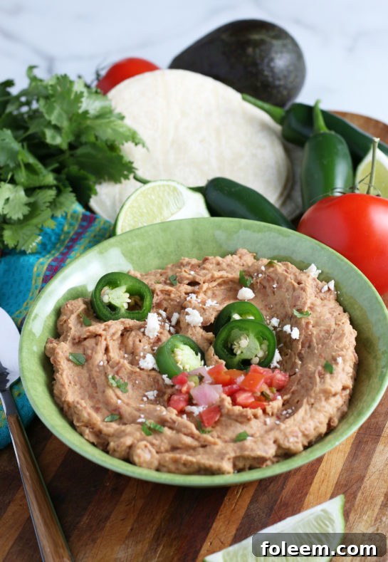 Another mouth-watering shot of homemade refried beans, proving they are better than any Mexican restaurant version.