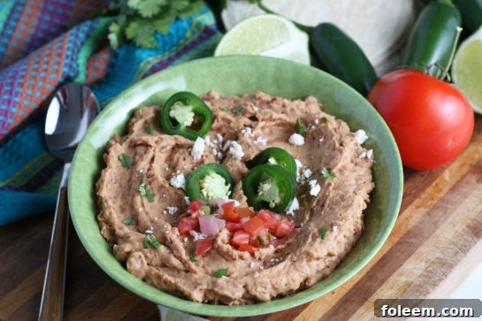 A smaller, focused image of the homemade refried beans, emphasizing their rich, appealing texture.