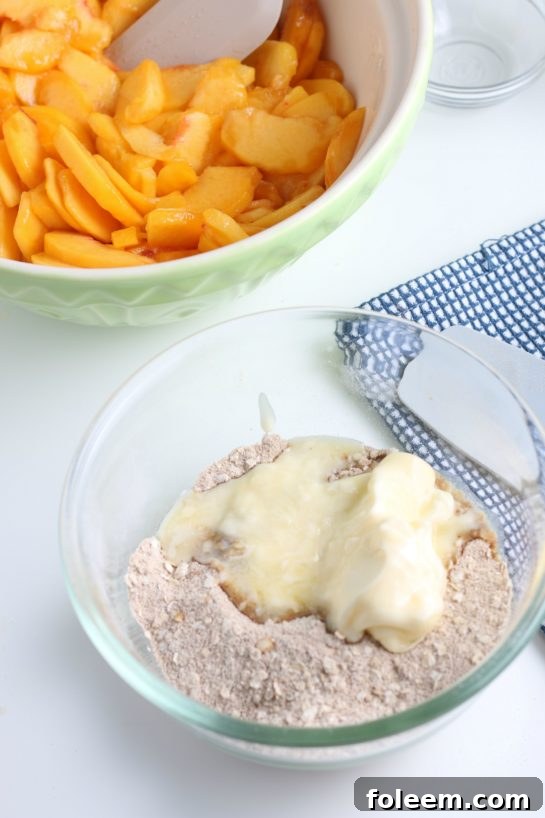 Working softened butter into the dry crumb topping ingredients