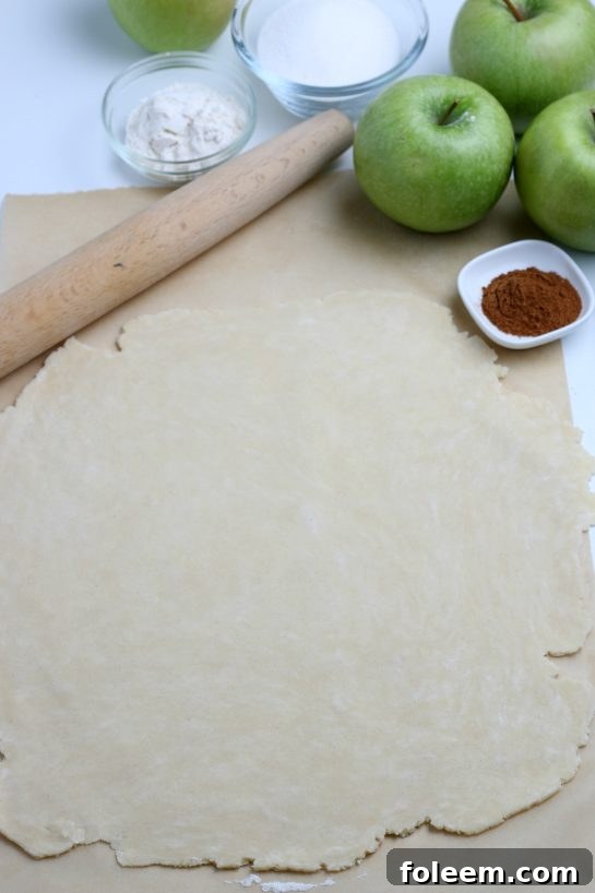 The pie crust dough rolled out for the apple crostata recipe