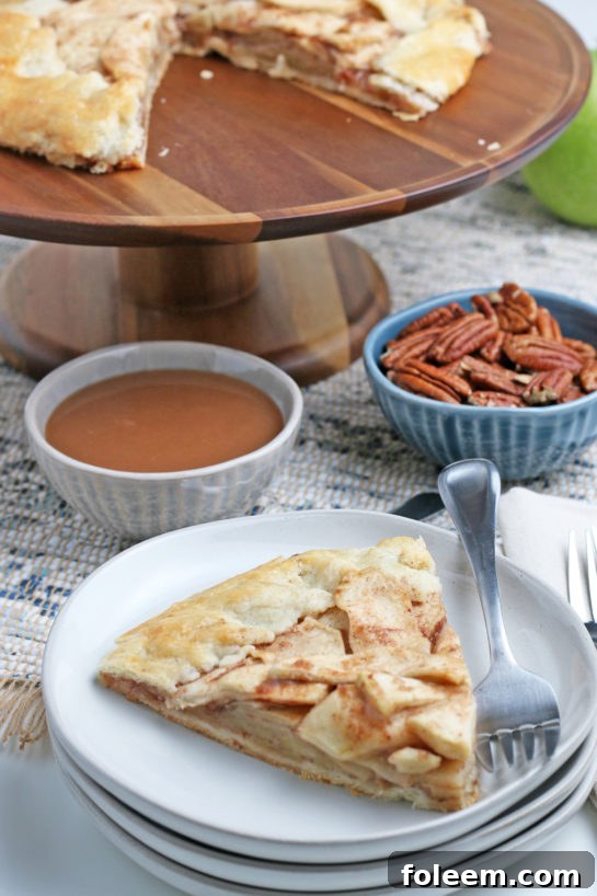 Easy fall Apple Crostata recipe is a simple, rustic tart filled with sweet apple filling and is one of our favorite new ways to enjoy one of our favorite fall fruit!