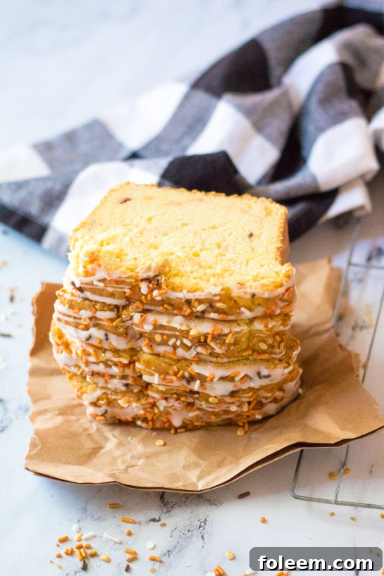 Super moist and flavorful Fall Confetti Sweet Bread, perfect for Thanksgiving or Christmas, easy to make with just a bowl, spatula, and loaf pan.