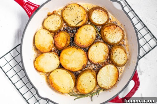 Butter sizzling and caramelizing in a pan before potatoes are added for the melting potatoes recipe