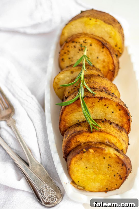 Freshly baked melting potatoes in a serving dish, ready for the table