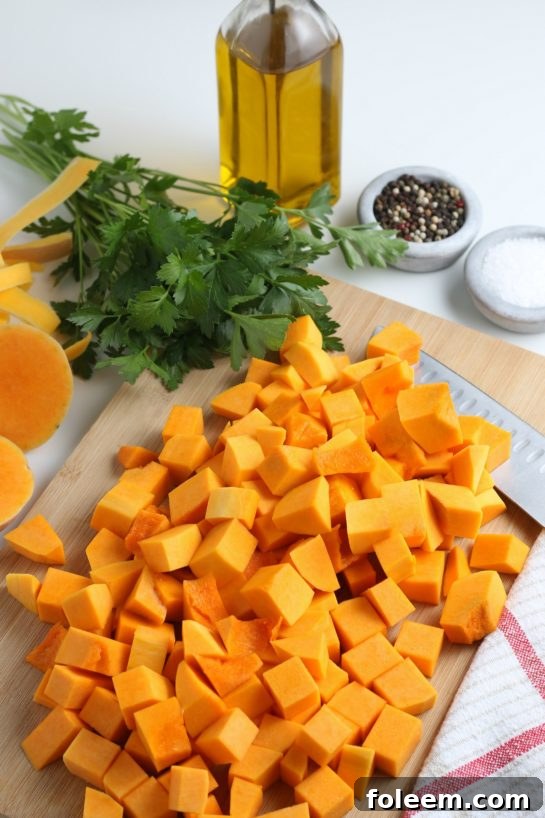 Easy Roasted Butternut Squash recipe has so much flavor and is a delicious side dish for Thanksgiving and Christmas! It is so tasty and a little different than the standard fare.