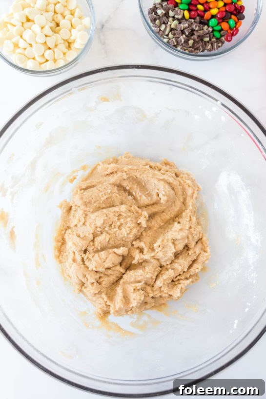 Mixing the ingredients needed for Edible Cookie Dough Bombs recipe
