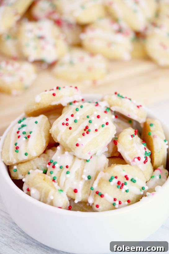 Delicious Bite-size soft and buttery Christmas Sugar Cookie Bites, perfect for holiday gatherings.