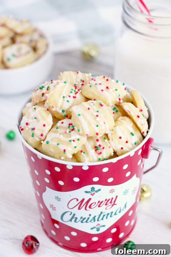 Close-up of frosted Christmas Sugar Cookie Bites, ready for holiday enjoyment.