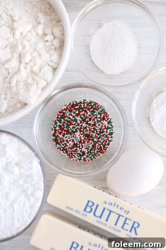 All the essential ingredients laid out to make the homemade Christmas Sugar Cookie Bites recipe.