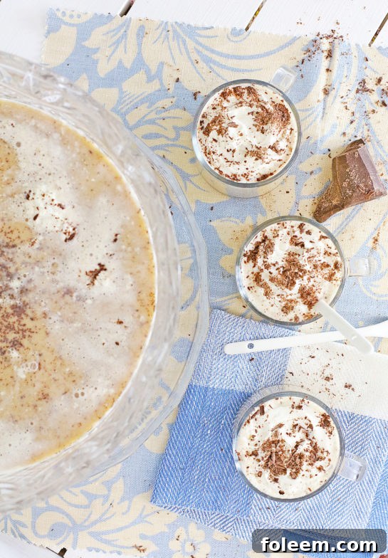 Coffee Punch overflowing in a large glass punch bowl, ready for celebrations.