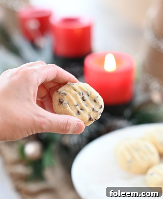 Homemade Chocolate Chip Shortbread Cookies stacked on a plate
