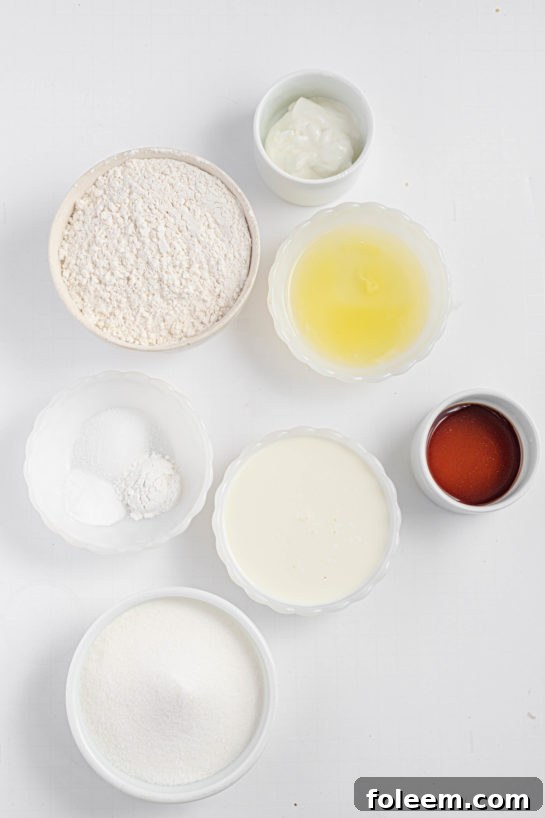 A selection of ingredients laid out, essential for baking the delicious Champagne Cupcakes recipe.