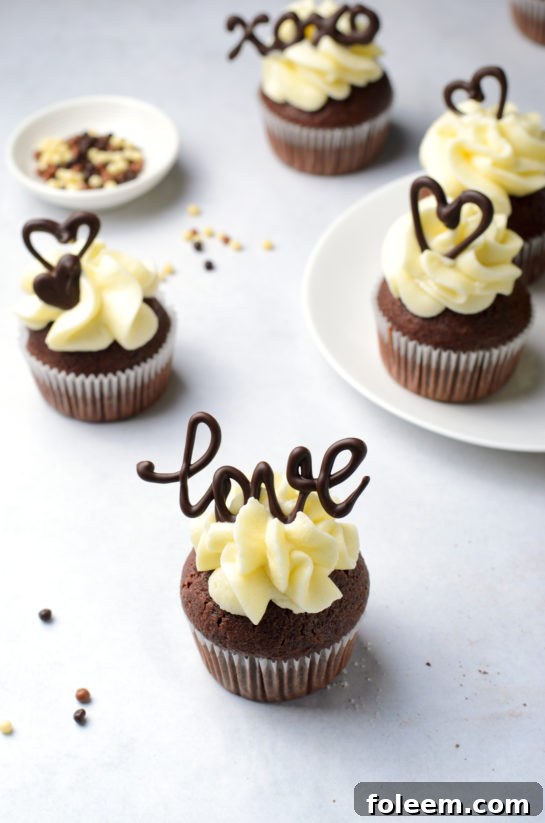 The final touches being added to the elegant Valentine's Day Lover's Chocolate Cupcakes.