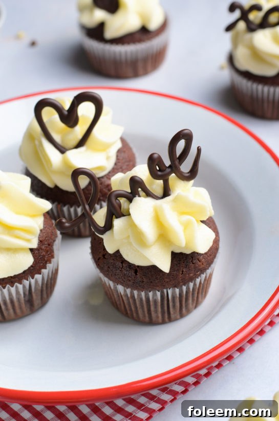 Vibrant close-up photo of the holiday Valentine's Day Lover's Chocolate Cupcakes, highlighting their festive appeal.