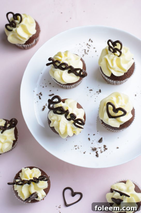 An inviting overhead photo of the holiday Valentine's Day Lover's Chocolate Cupcakes, showcasing a full batch.