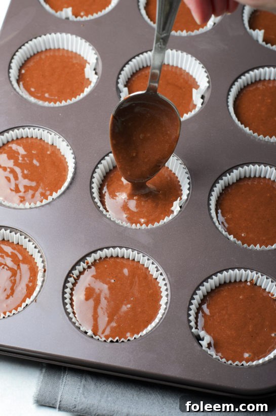 Preparing the batter for Lover's Chocolate Cupcakes, a simple yet rewarding process.