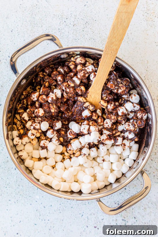 Mixing in the marshmallows and nuts to make the Valentine's Day Best Rocky Road recipe