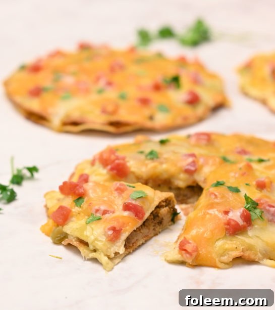 The Mexican Pizza recipe is a quick and easy dinner idea for Mexican night, taco Tuesday, or Cinco de Mayo! The whole family will love this for Mexican food night!