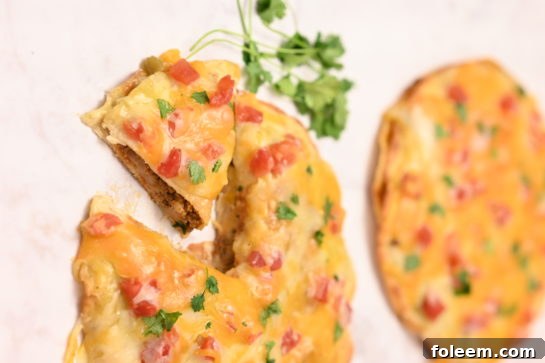 The Mexican Pizza recipe is a quick and easy dinner idea for Mexican night, taco Tuesday, or Cinco de Mayo! The whole family will love this for Taco tuesday!