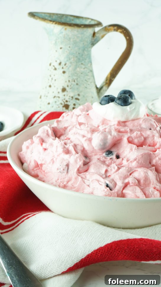 Close-up of the Easy Red White and Blue Fluff Salad, perfect for summer picnics or potlucks.
