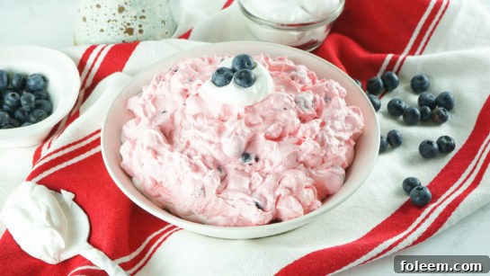 Close-up overhead shot of Red White and Blue Fluff Salad in a bowl, perfect for Memorial Day or 4th of July celebrations.