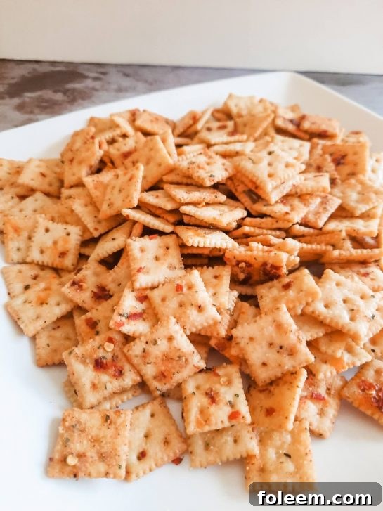 A delicious bowl of Spicy Alabama Fire Crackers ready to be served, perfect for any gathering.
