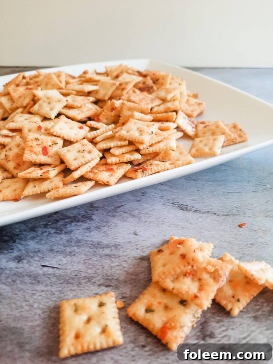 A close-up of a serving bowl of Spicy Alabama Fire Crackers, beautifully seasoned and ready for guests.