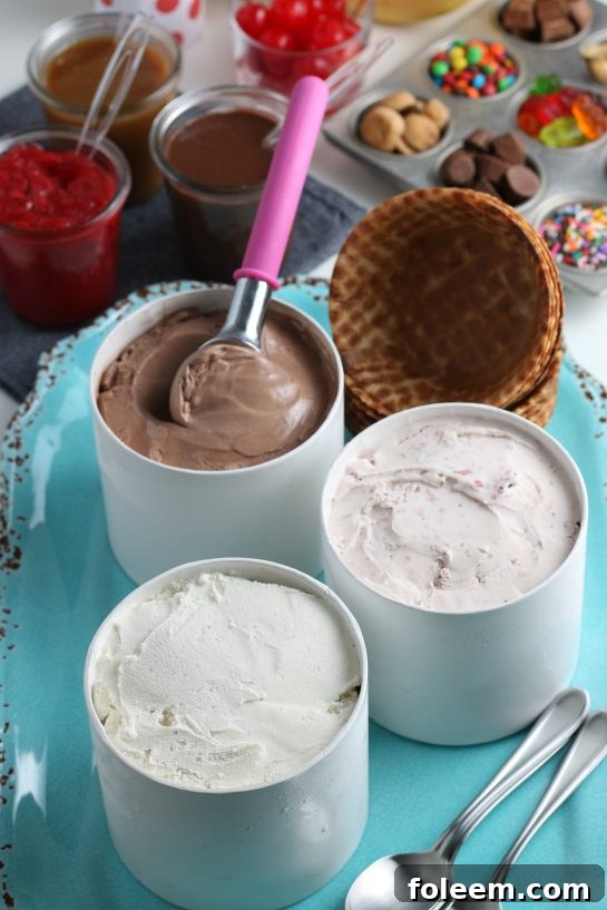 Close-up of a DIY ice cream sundae bar showcasing waffle bowls, ice cream, and a variety of sweet toppings.