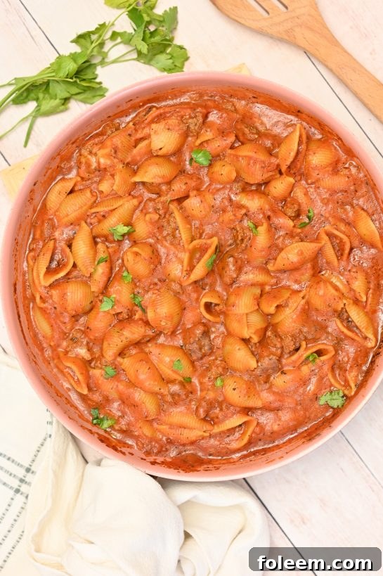 Easy, creamy Beef and Shells is the ultimate creamy pasta recipe! It is incredibly rich, filling, and screams cold-weather comfort food!