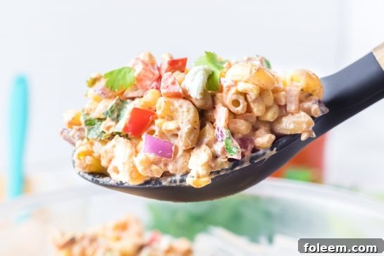 Close-up of the vibrant Mexican Street Corn Pasta Salad, showcasing its fresh ingredients.