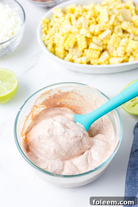 Mixing the creamy and zesty dressing for the Mexican Street Corn Pasta Salad.